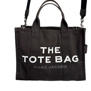 Marc Jacob’s black canvas the tote bag